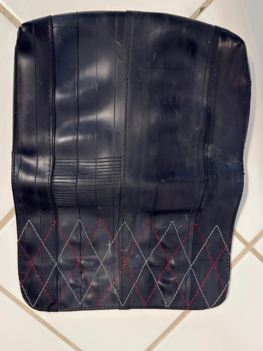 Recycled tire Broadway clutch with burgundy interior